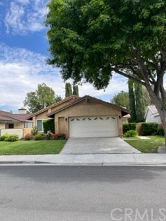 25634 Rancho Adobe Road Valencia, CA 91355 - Photo 1 of 1 front view of house with a yard
