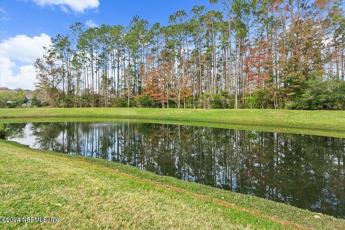1212 Coghill Circle St. Augustine, FL 32092 - Photo 18 of 18 a view of a lake with a big yard