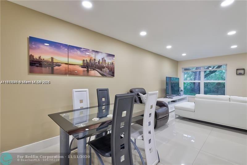 3100 Riverside Drive, Unit 107 Coral Springs, FL 33065 - Photo 8 of 33 a view of a room with furniture and window