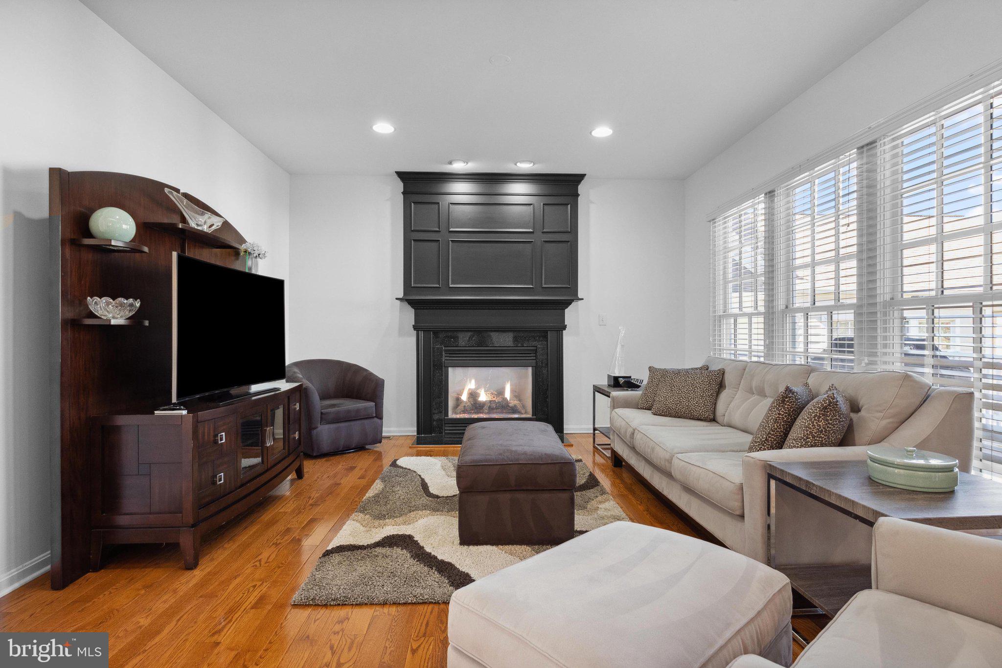 1615 Silver Birch Road Huntingdon Valley, PA 19006 - Photo 12 of 69 a living room with furniture and a flat screen tv