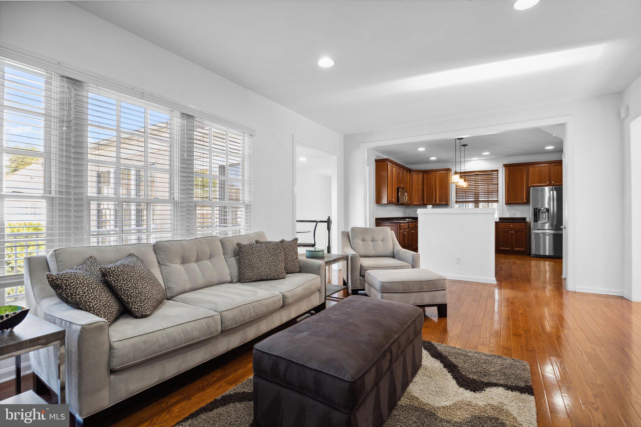 1615 Silver Birch Road Huntingdon Valley, PA 19006 - Photo 13 of 69 a living room with furniture and a large window