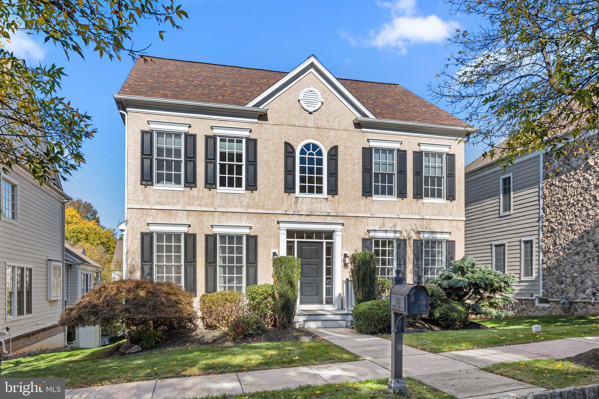 1615 Silver Birch Road Huntingdon Valley, PA 19006 - Photo 2 of 69 a front view of a house with a yard and plants