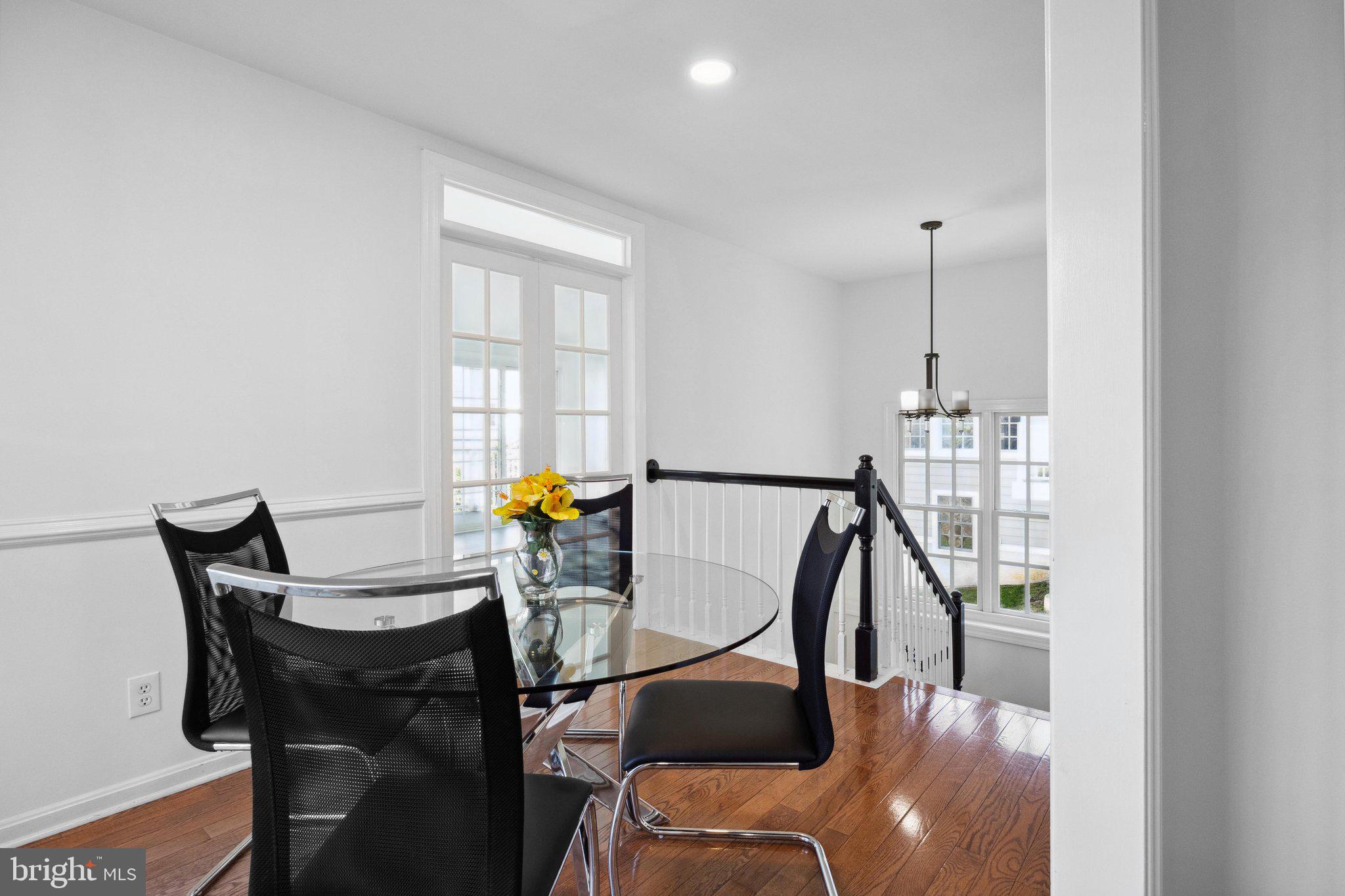 1615 Silver Birch Road Huntingdon Valley, PA 19006 - Photo 24 of 69 a view of a dining room with furniture window and wooden floor