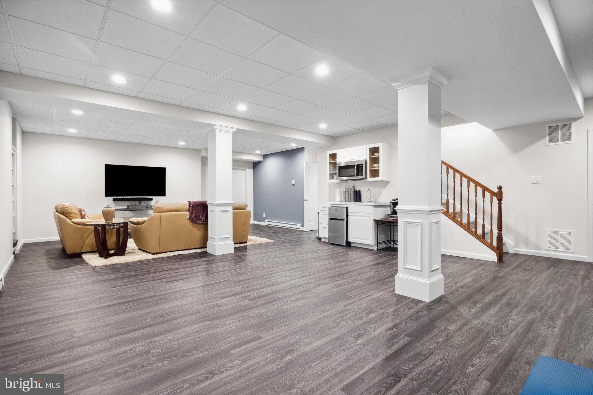 1615 Silver Birch Road Huntingdon Valley, PA 19006 - Photo 33 of 69 a view of a livingroom with furniture and wooden floor
