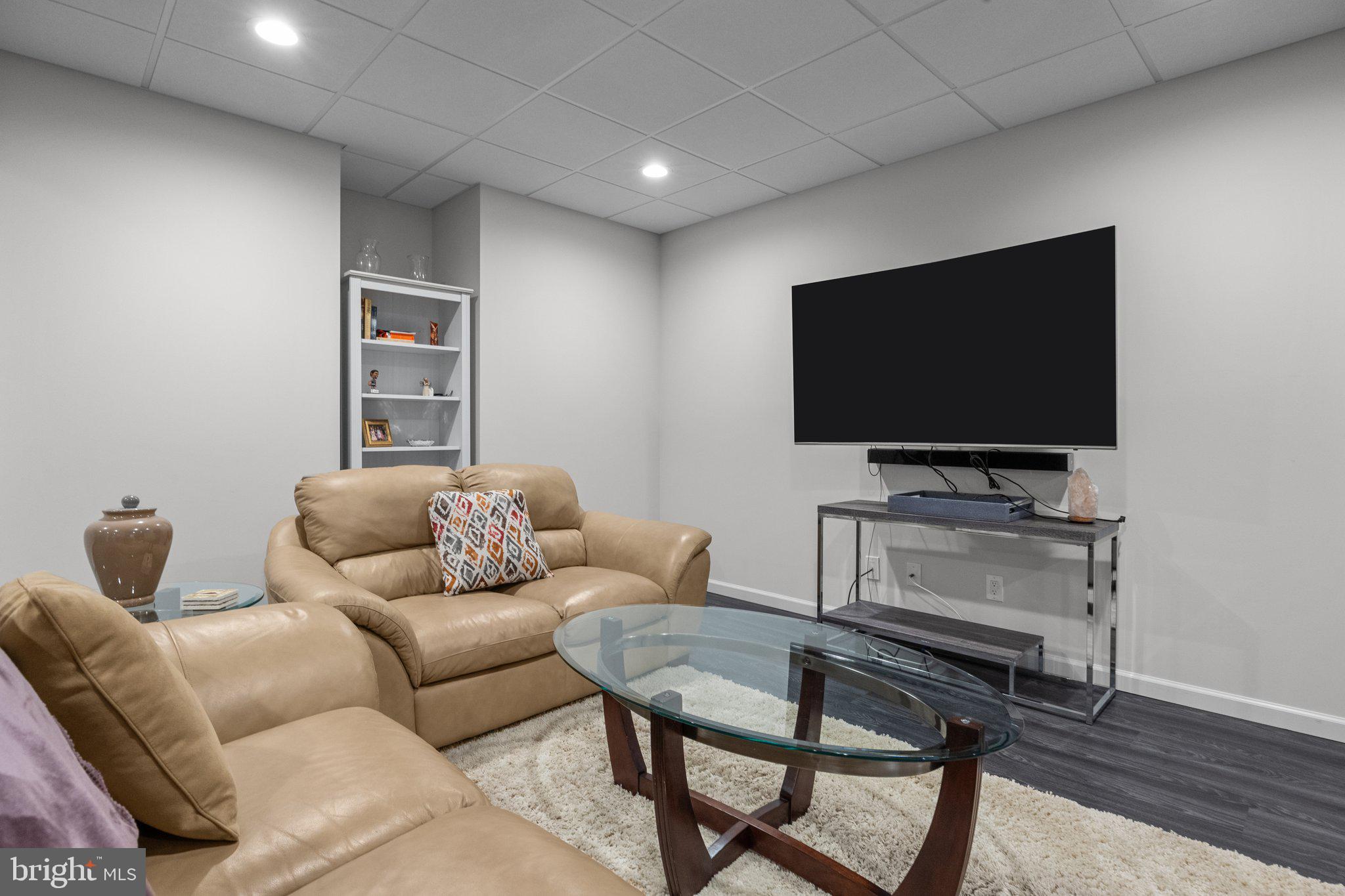 1615 Silver Birch Road Huntingdon Valley, PA 19006 - Photo 36 of 69 a living room with furniture and a flat screen tv