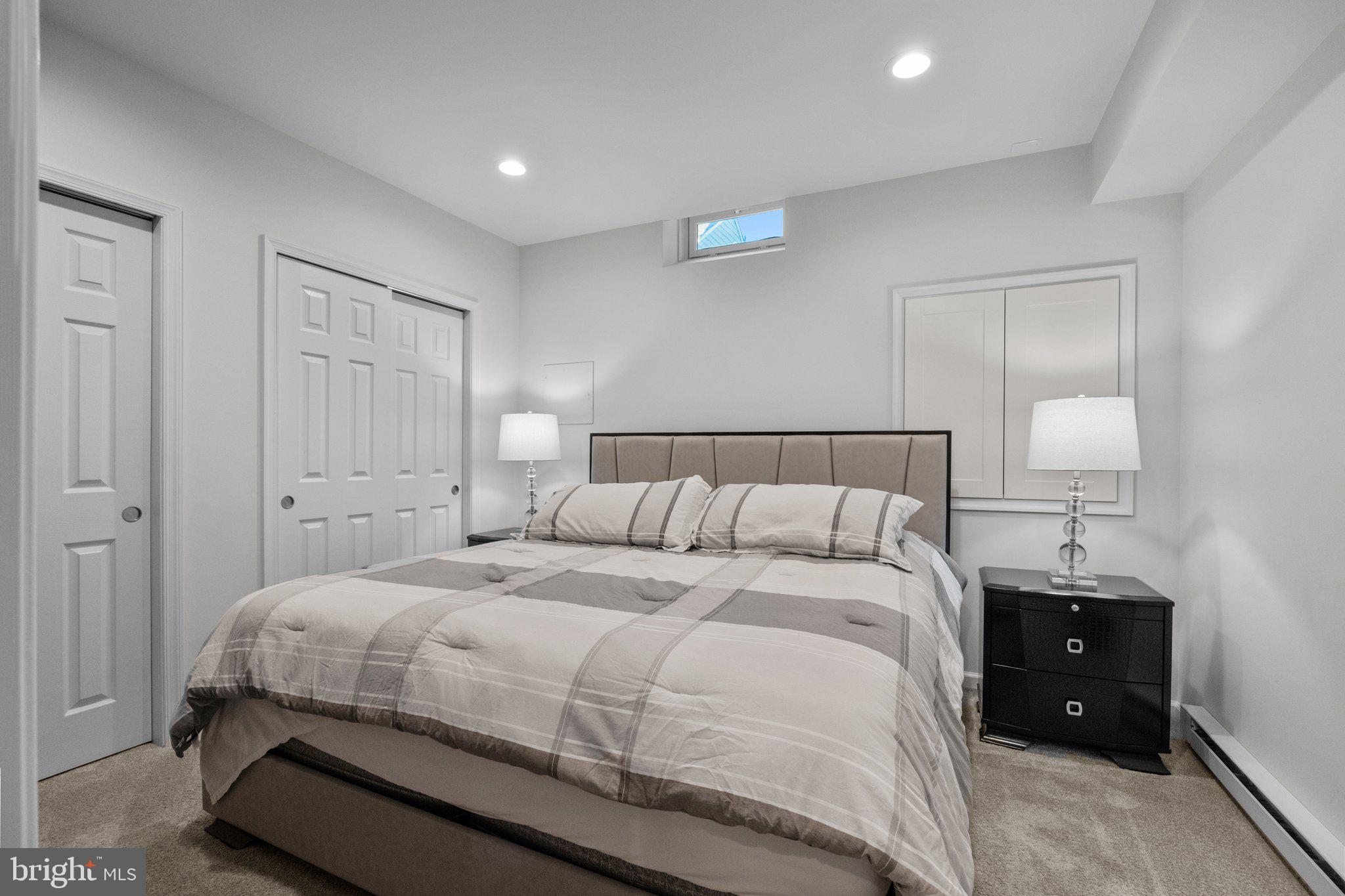 1615 Silver Birch Road Huntingdon Valley, PA 19006 - Photo 38 of 69 a bedroom with a bed and a lamp