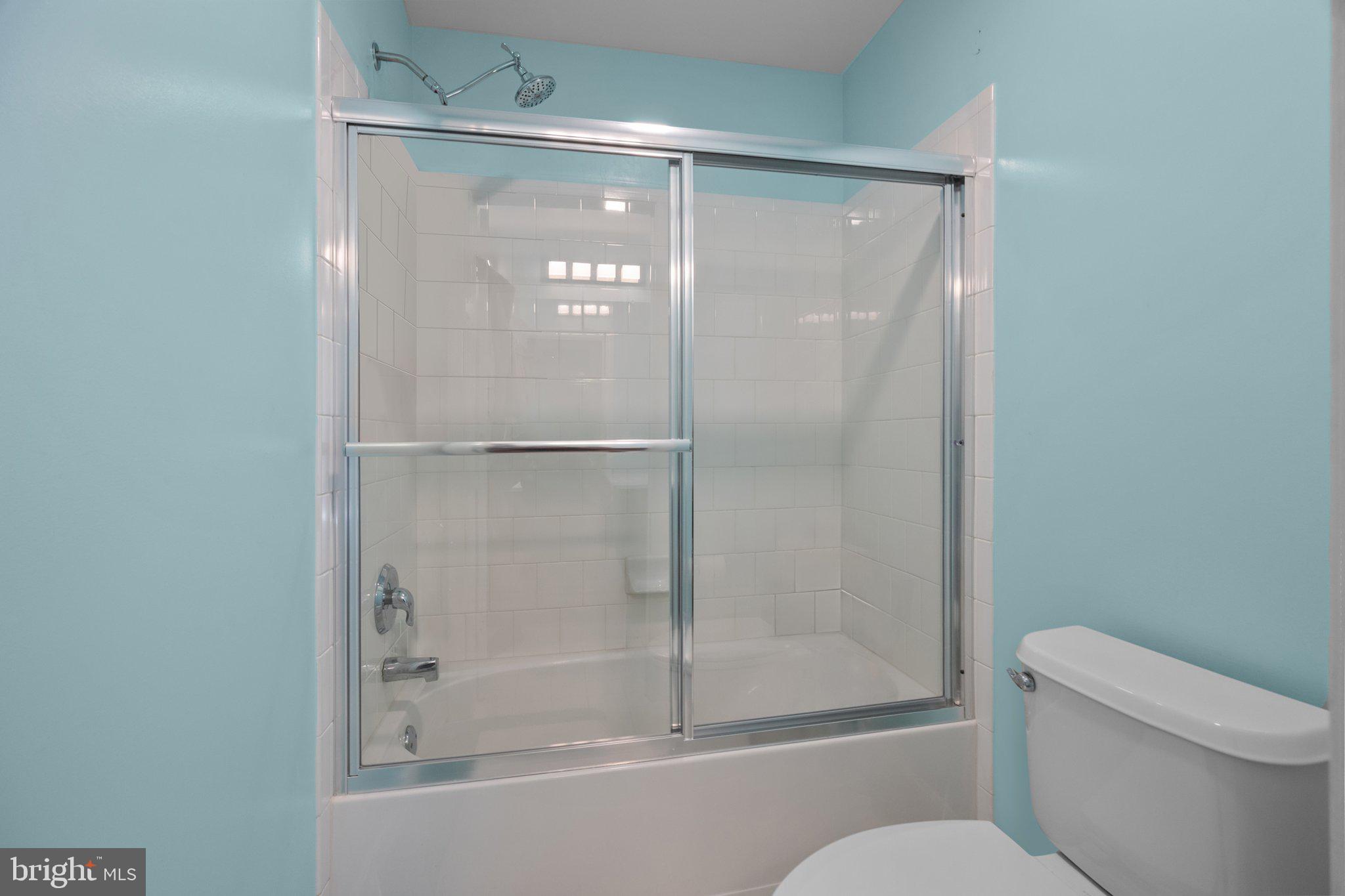 1615 Silver Birch Road Huntingdon Valley, PA 19006 - Photo 47 of 69 a bathroom with a glass shower door