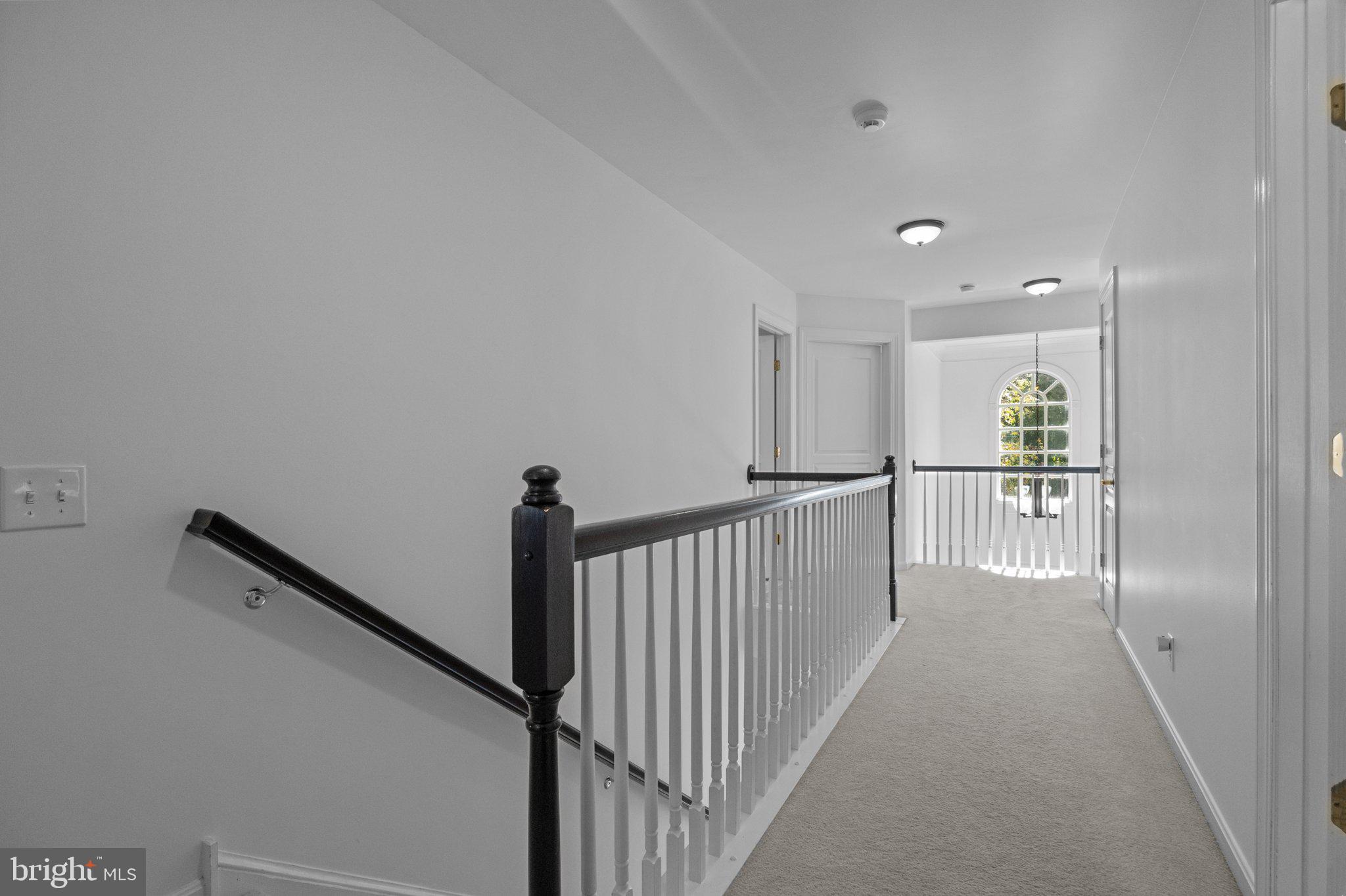 1615 Silver Birch Road Huntingdon Valley, PA 19006 - Photo 56 of 69 a view of a hallway with wooden floor