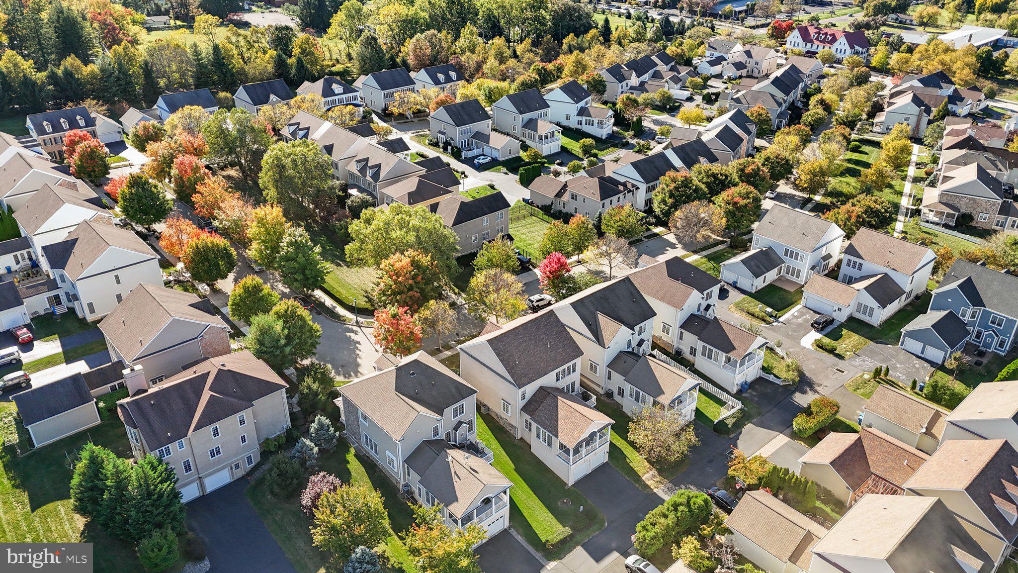 1615 Silver Birch Road Huntingdon Valley, PA 19006 - Photo 68 of 69 an aerial view of a residential apartment building with a yard and parking spaces
