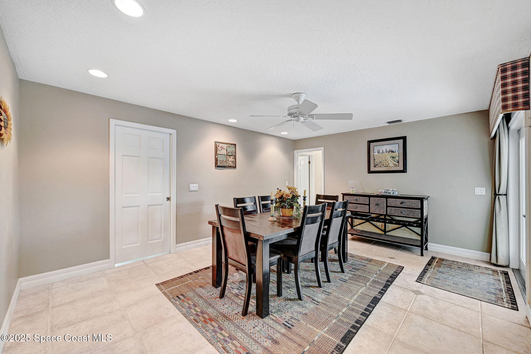 1428 Gleneagles Way Rockledge, FL 32955 - Photo 18 of 90 a view of a dining room with furniture