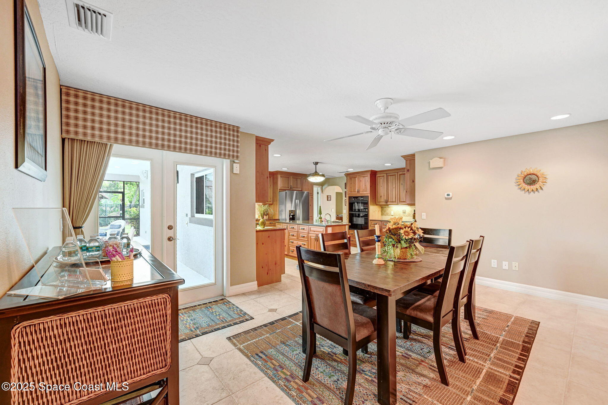 1428 Gleneagles Way Rockledge, FL 32955 - Photo 20 of 90 a view of a dining room with furniture