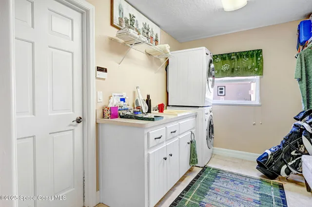 a view of a two chairs in the balcony