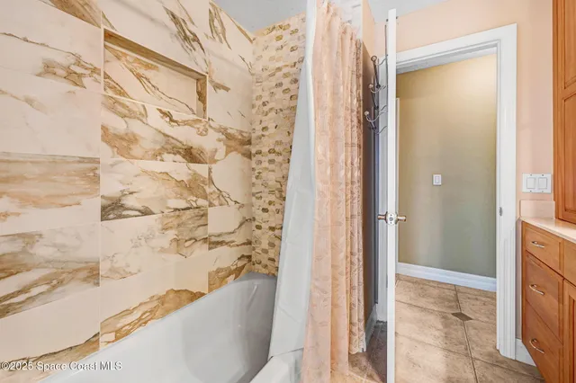 a view of a backyard with a swimming pool