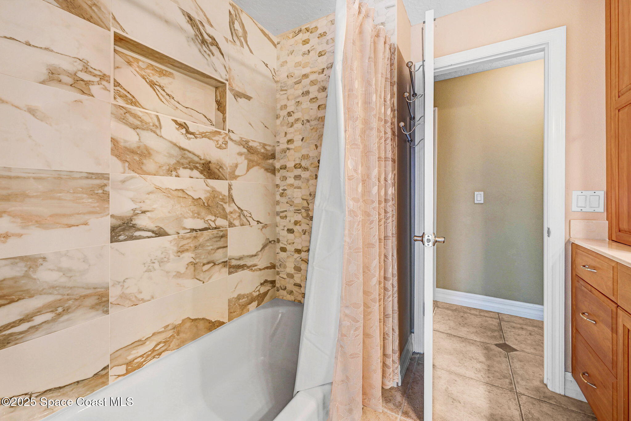 1428 Gleneagles Way Rockledge, FL 32955 - Photo 30 of 90 a bathroom with a bathtub and shower
