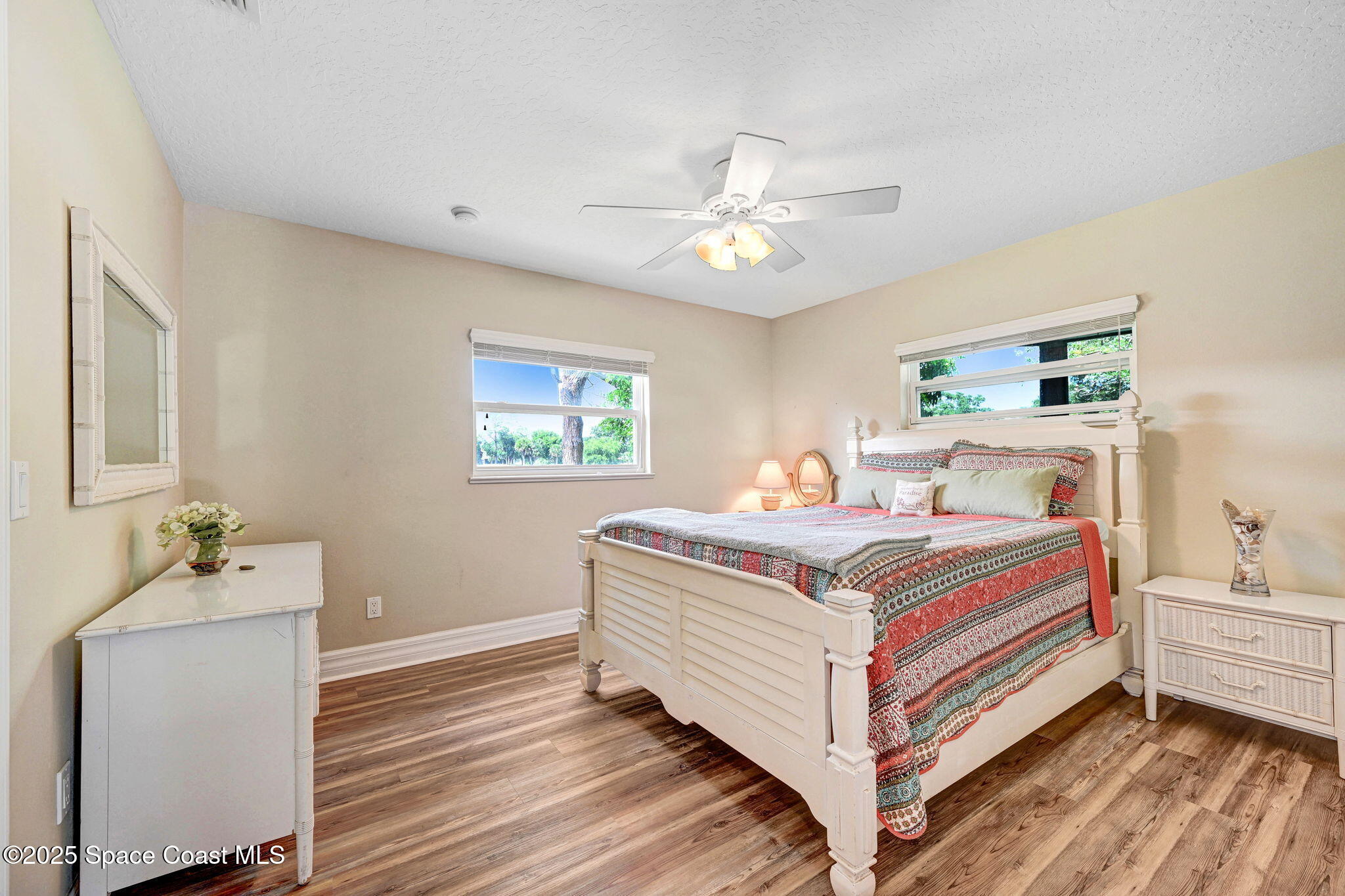 1428 Gleneagles Way Rockledge, FL 32955 - Photo 31 of 90 a bed room with a bed and a chandelier