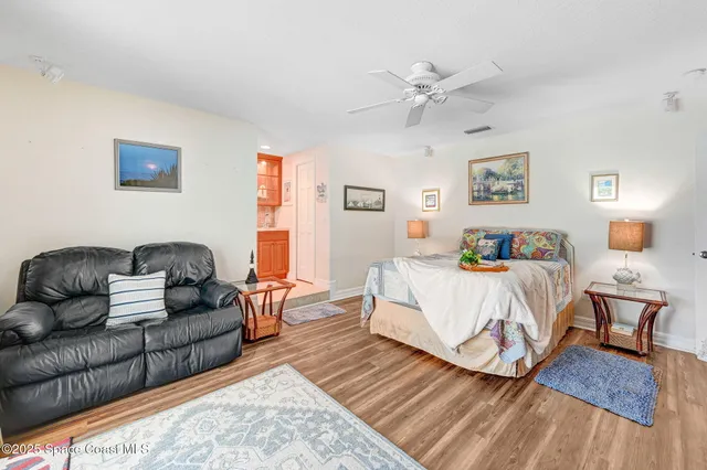 an aerial view of a house with a garden