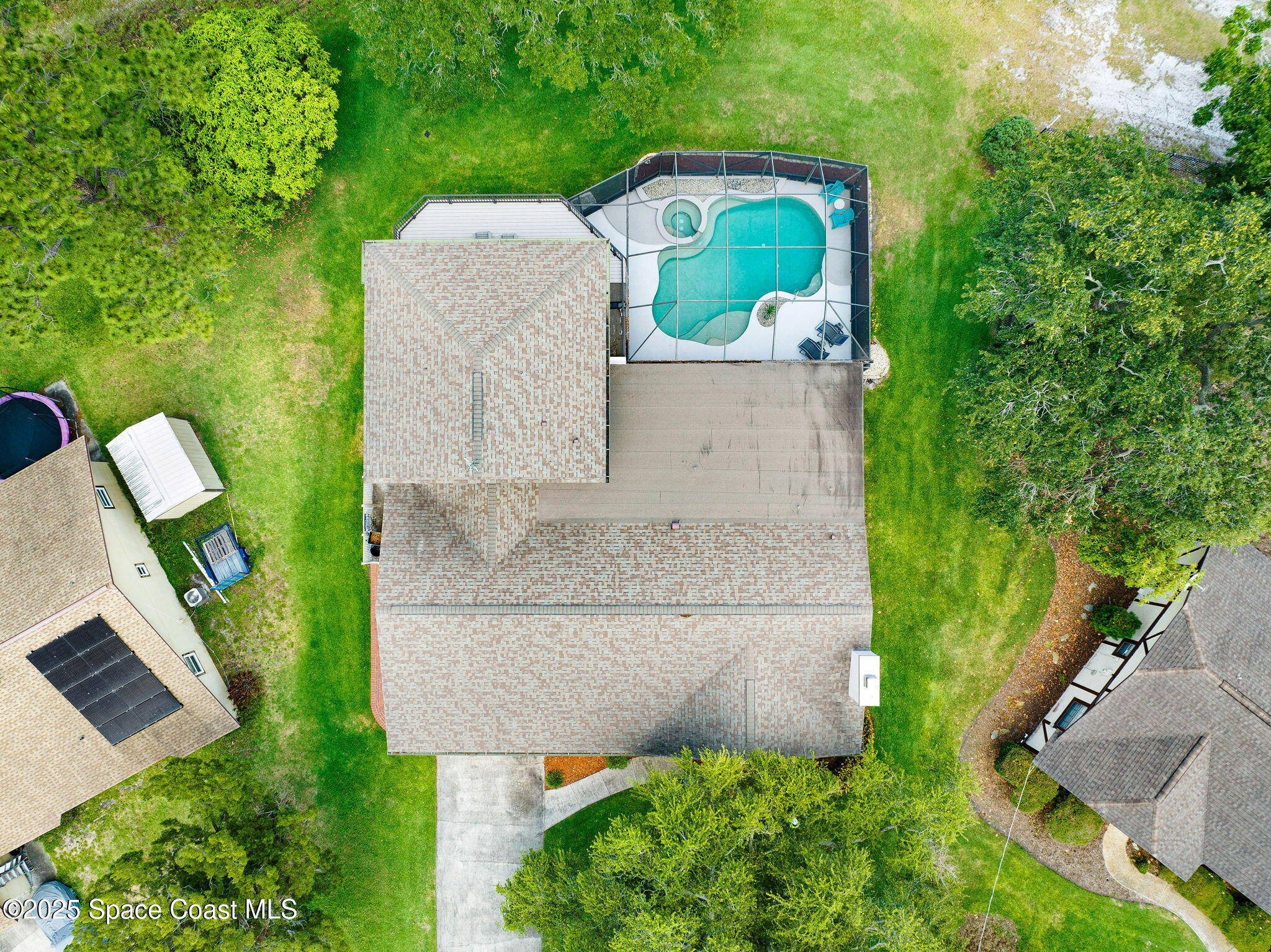 1428 Gleneagles Way Rockledge, FL 32955 - Photo 60 of 90 an aerial view of a house with a yard