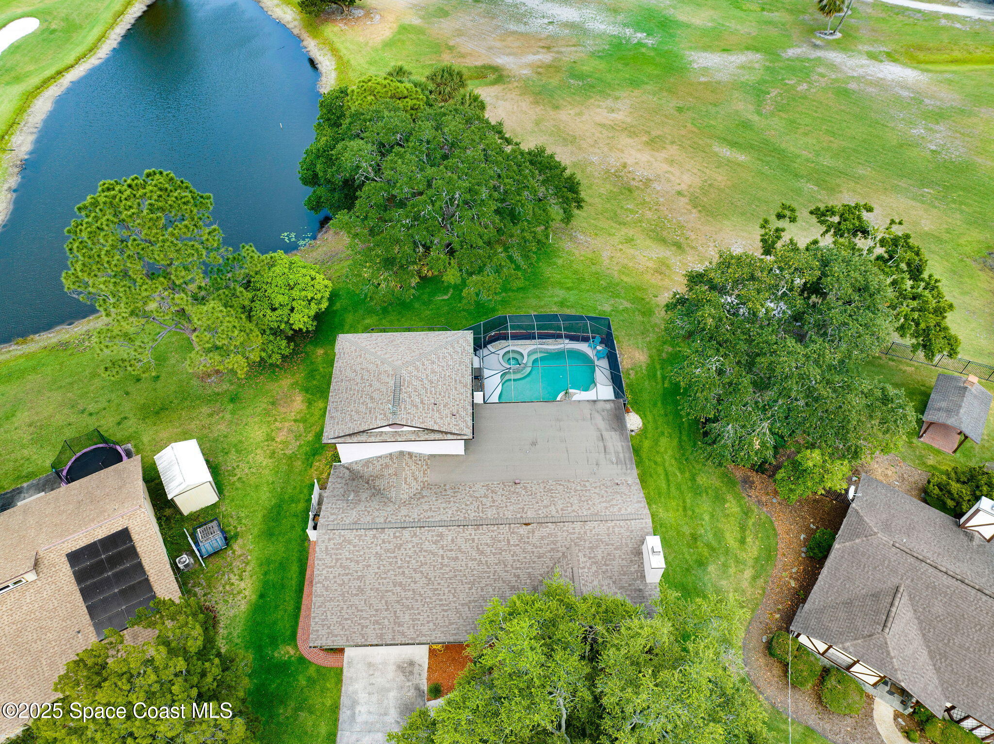 1428 Gleneagles Way Rockledge, FL 32955 - Photo 61 of 90 an aerial view of a house with garden space and street view