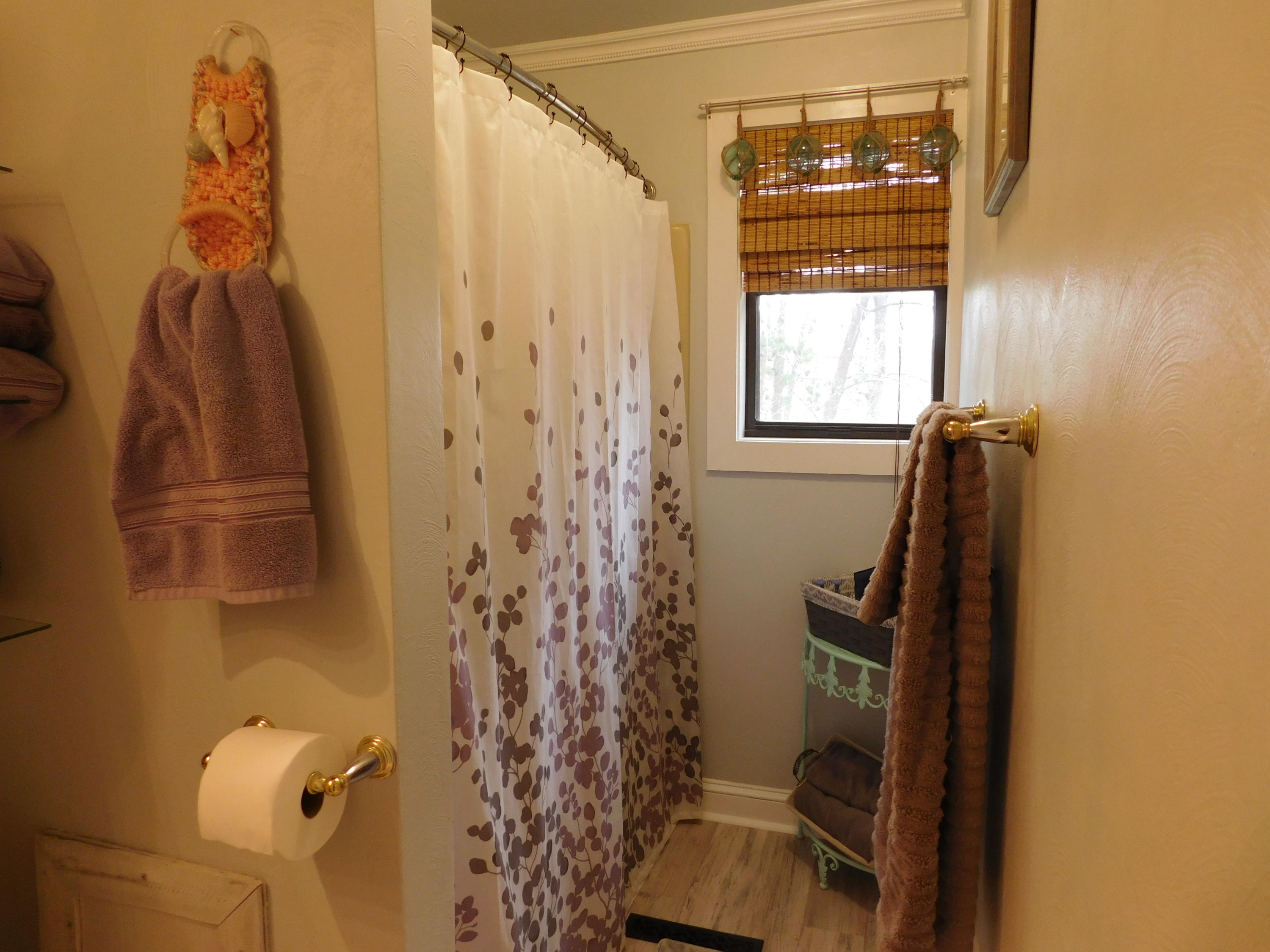 1463 Stripers Cove Road Goodview, VA 24095 - Photo 25 of 44 a bathroom with a shower