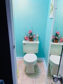 1463 Stripers Cove Road Goodview, VA 24095 - Photo 27 of 44 a bathroom with a toilet and a sink