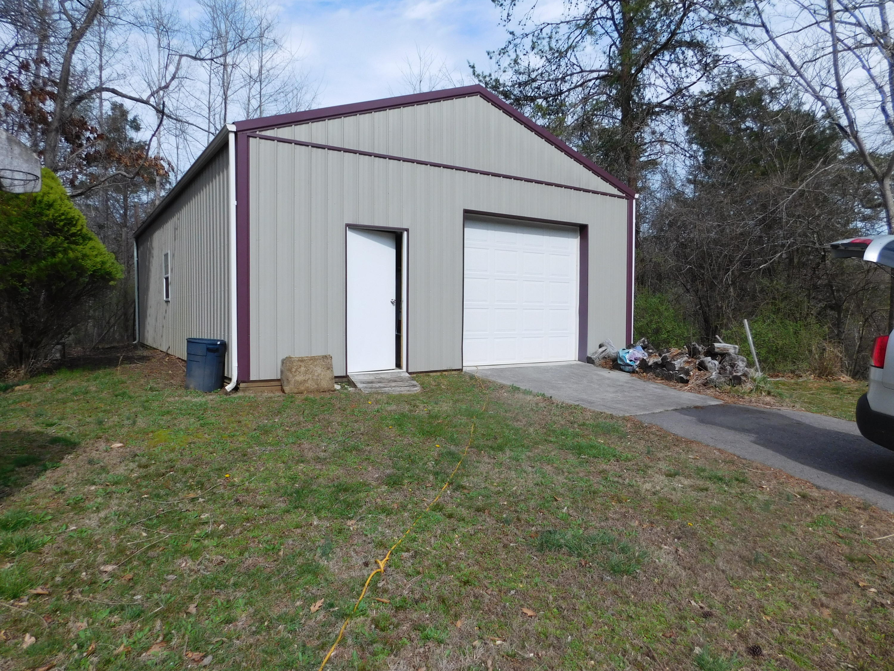 1463 Stripers Cove Road Goodview, VA 24095 - Photo 4 of 44 a view of a house with backyard and garden