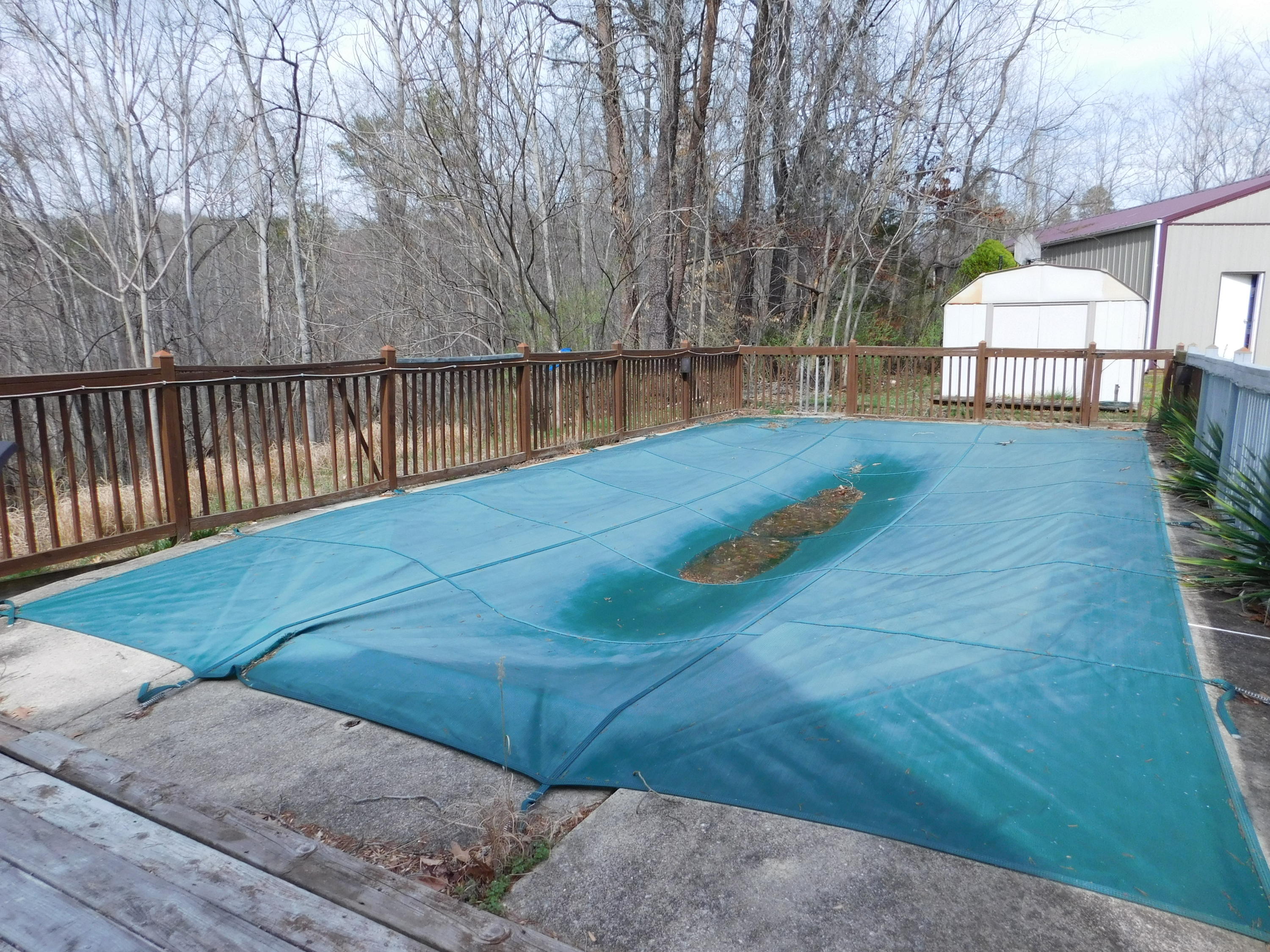 1463 Stripers Cove Road Goodview, VA 24095 - Photo 5 of 44 a view of a backyard with sitting area
