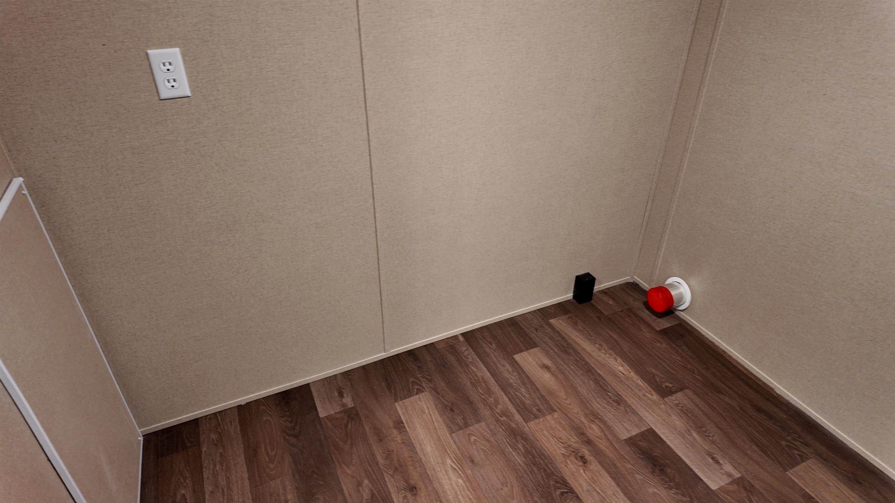 208 Marcy Cove Ripley, TN 38063 - Photo 12 of 14 Laundry area with dark wood finished floors and baseboards