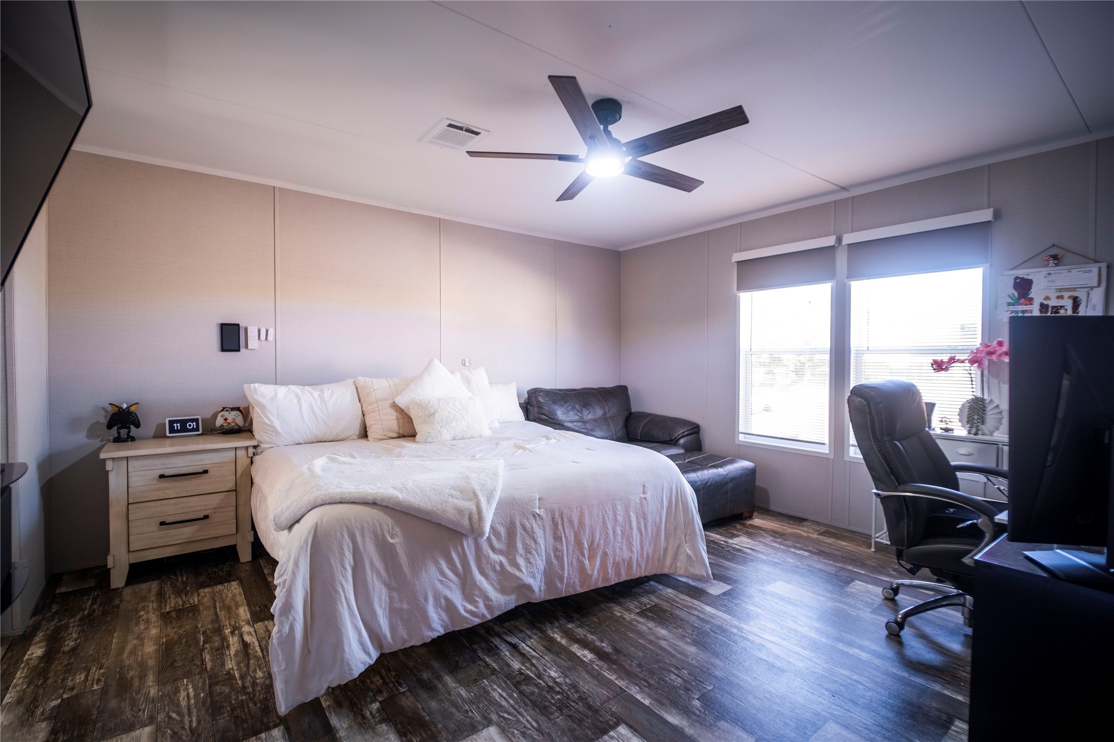 5402 Five Oaks Drive Spring, TX 77389 - Photo 11 of 31 Primary bedroom with ceiling fan and generous space.