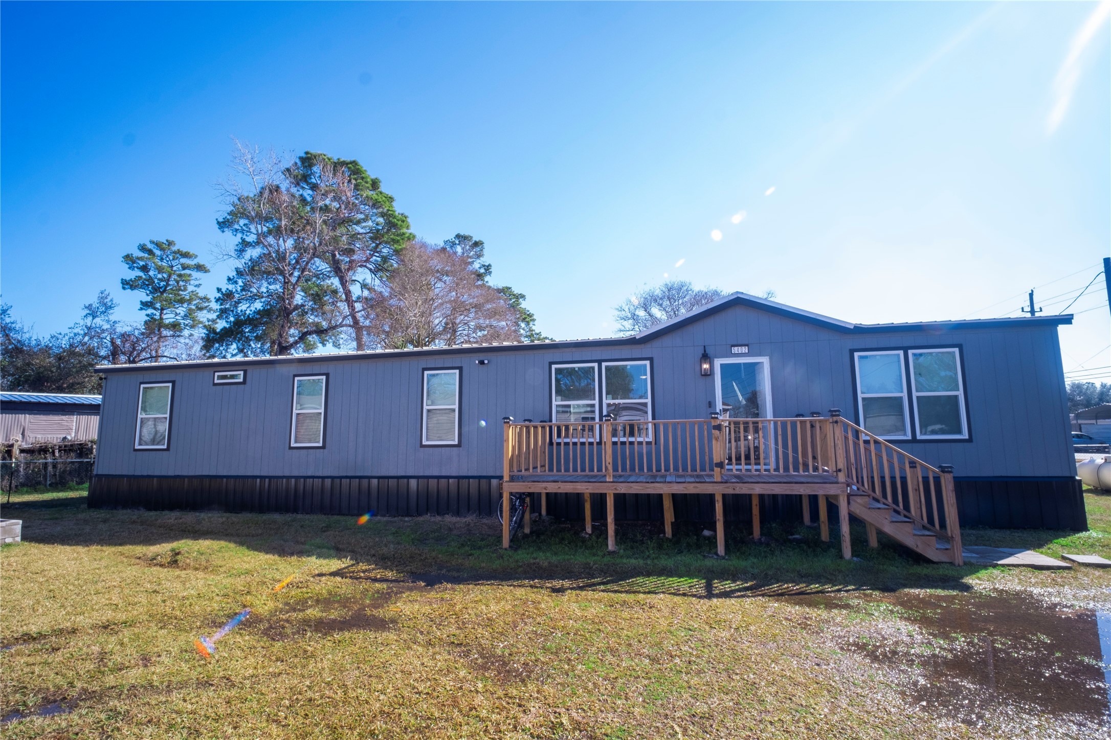 5402 Five Oaks Drive Spring, TX 77389 - Photo 2 of 31 Side front exterior view with yard space and trees.