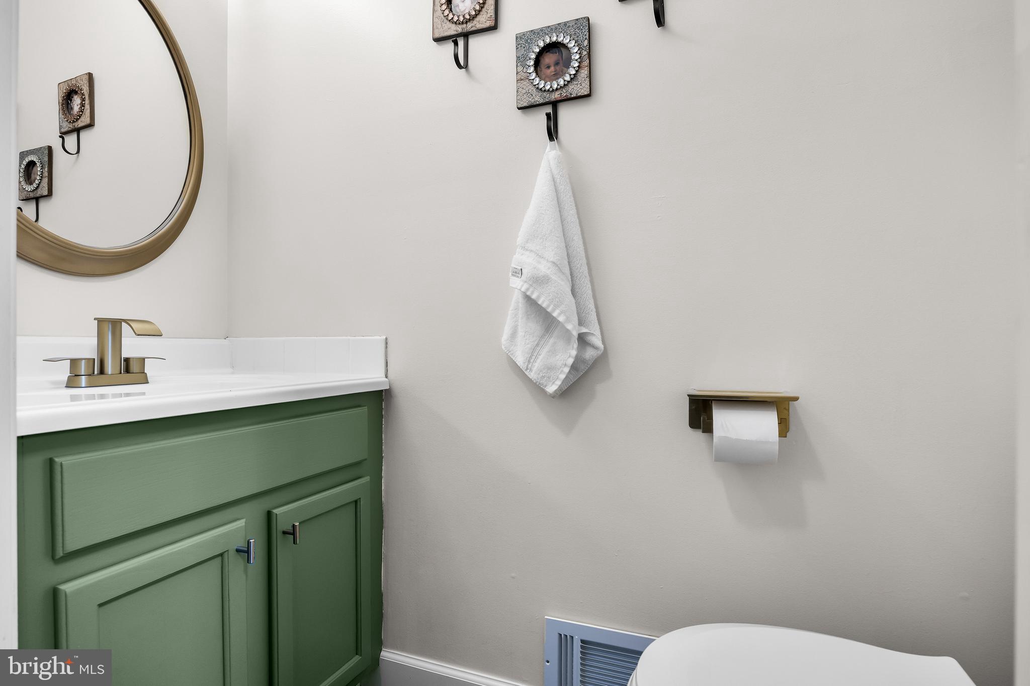 53 Cranberry Lane Delran, NJ 08075 - Photo 15 of 33 a bathroom with a sink mirror and toilet