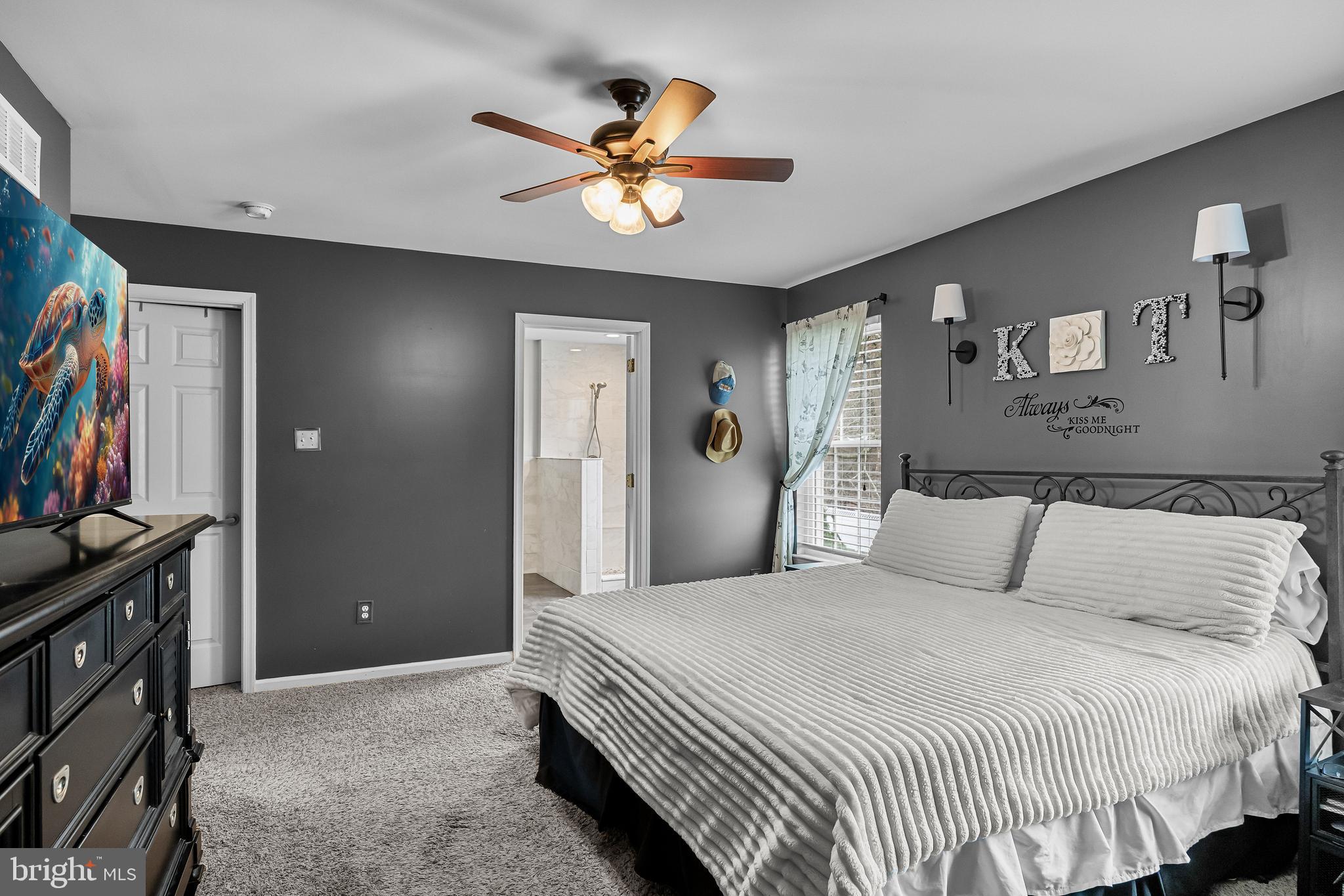 53 Cranberry Lane Delran, NJ 08075 - Photo 17 of 33 a bedroom with a bed and a chandelier