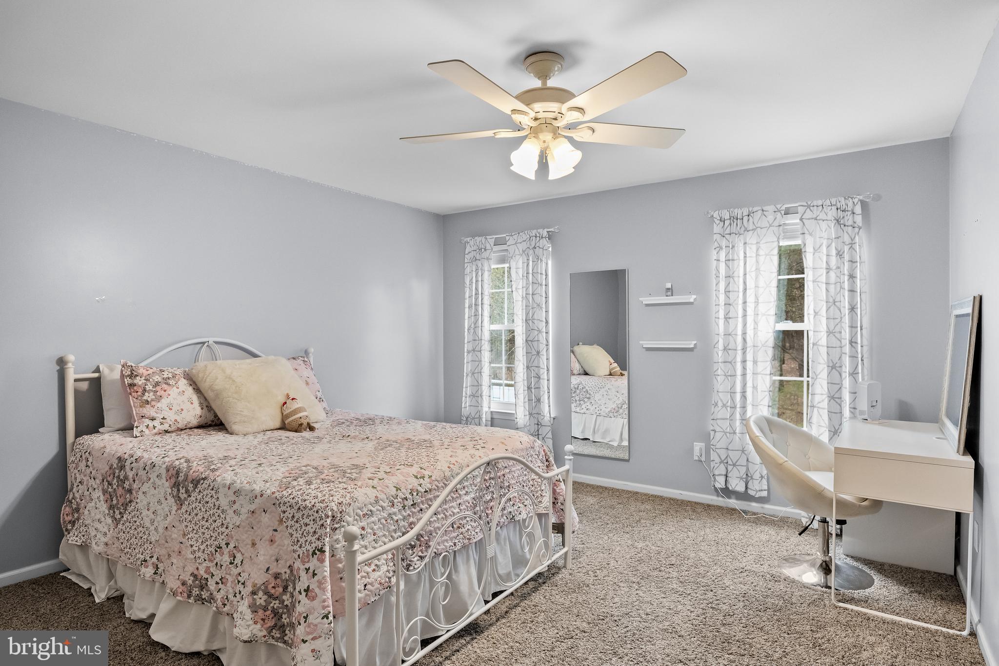53 Cranberry Lane Delran, NJ 08075 - Photo 20 of 33 a bedroom with a large bed and a chandelier