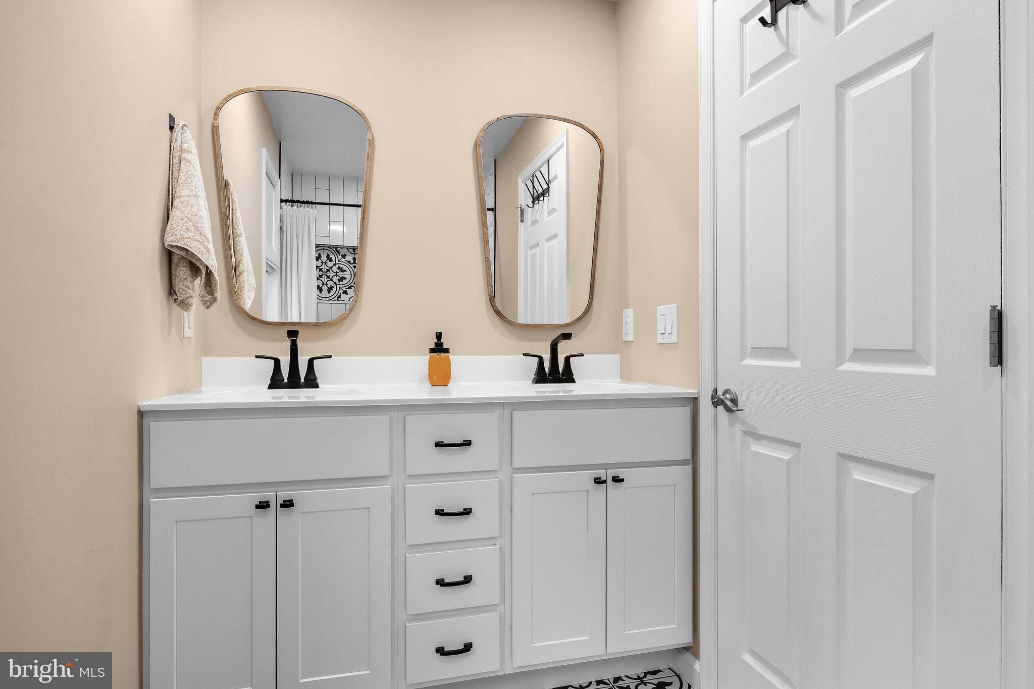 53 Cranberry Lane Delran, NJ 08075 - Photo 23 of 33 a bathroom with a sink and mirror