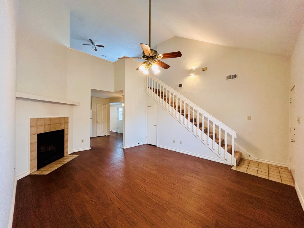 801 Valley View Drive, Unit A Pflugerville, TX 78660 - Photo 1 of 1 a view of empty room with fireplace and wooden floor