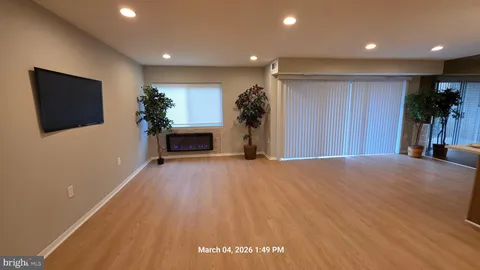 a view of a livingroom with a flat screen tv
