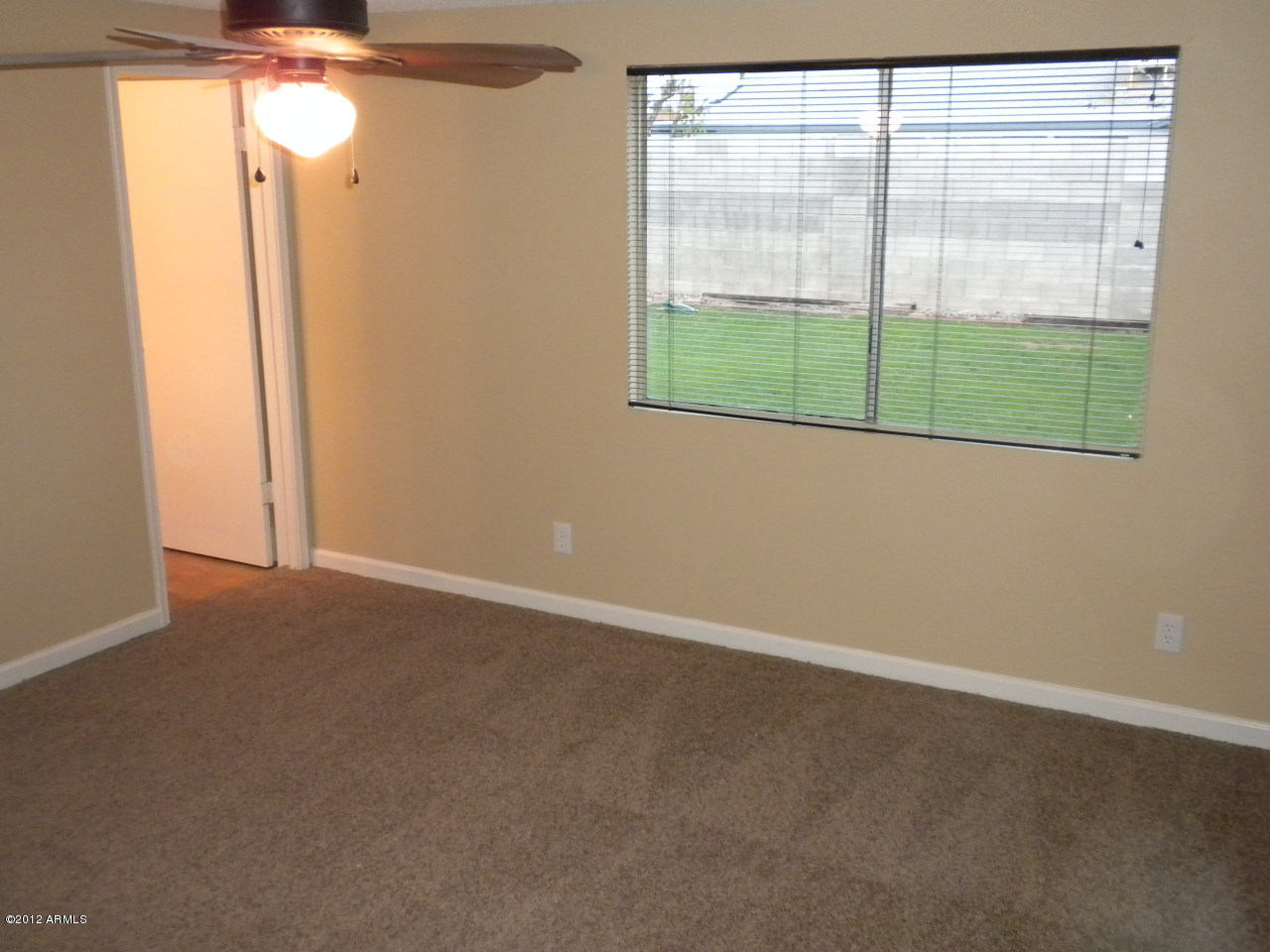 1506 West Colt Road Chandler, AZ 85224 - Photo 13 of 27 an empty room with a window