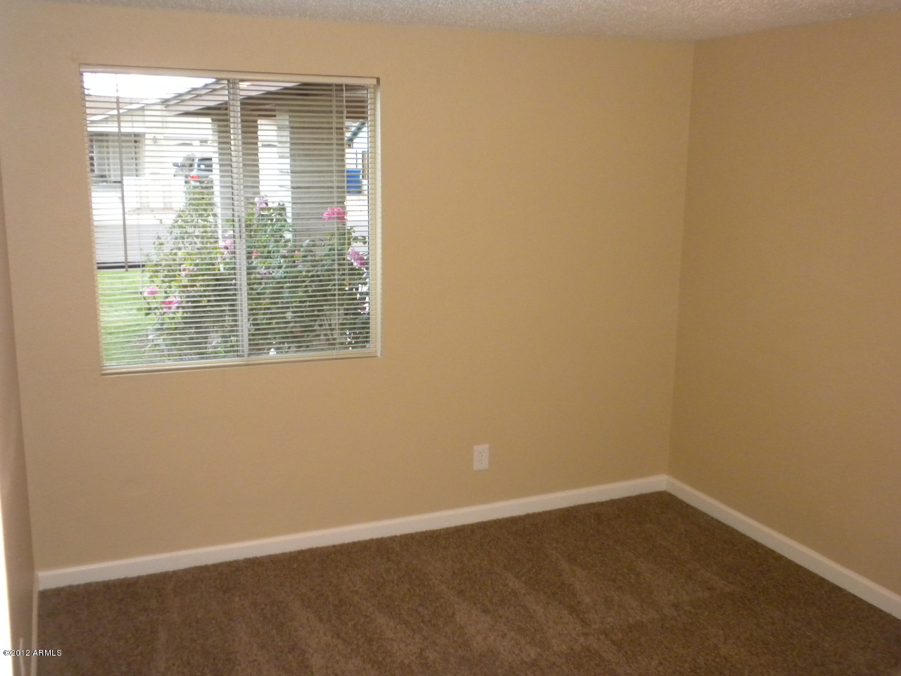 1506 West Colt Road Chandler, AZ 85224 - Photo 14 of 27 a view of an empty room with a window