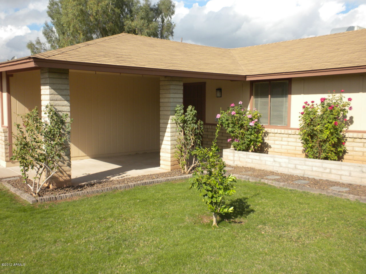 1506 West Colt Road Chandler, AZ 85224 - Photo 16 of 27 a front view of a house with garden