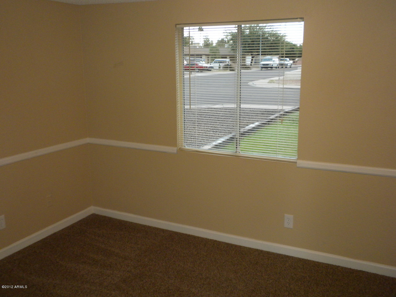 1506 West Colt Road Chandler, AZ 85224 - Photo 10 of 27 an empty room with a window