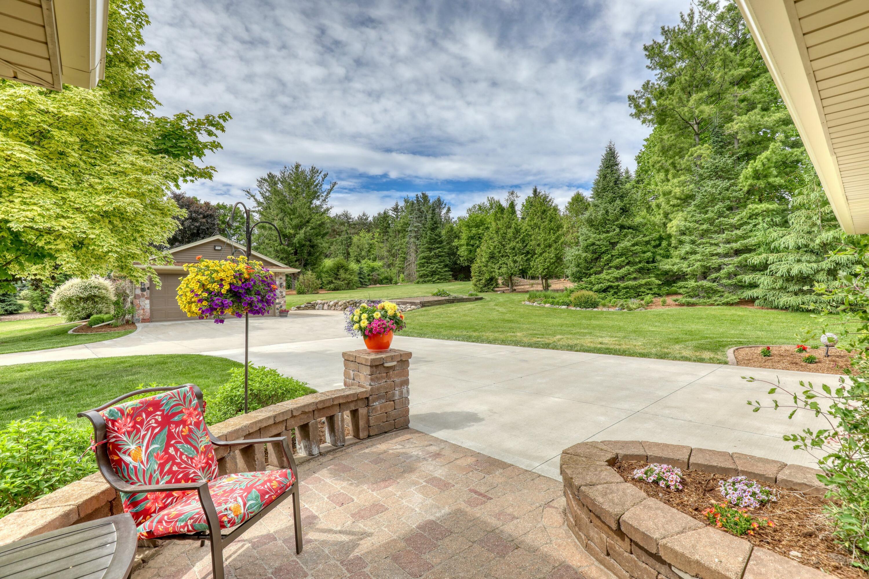 6715 Alpine Drive Addison, WI 53090 - Photo 54 of 59 Welcoming Front Patio