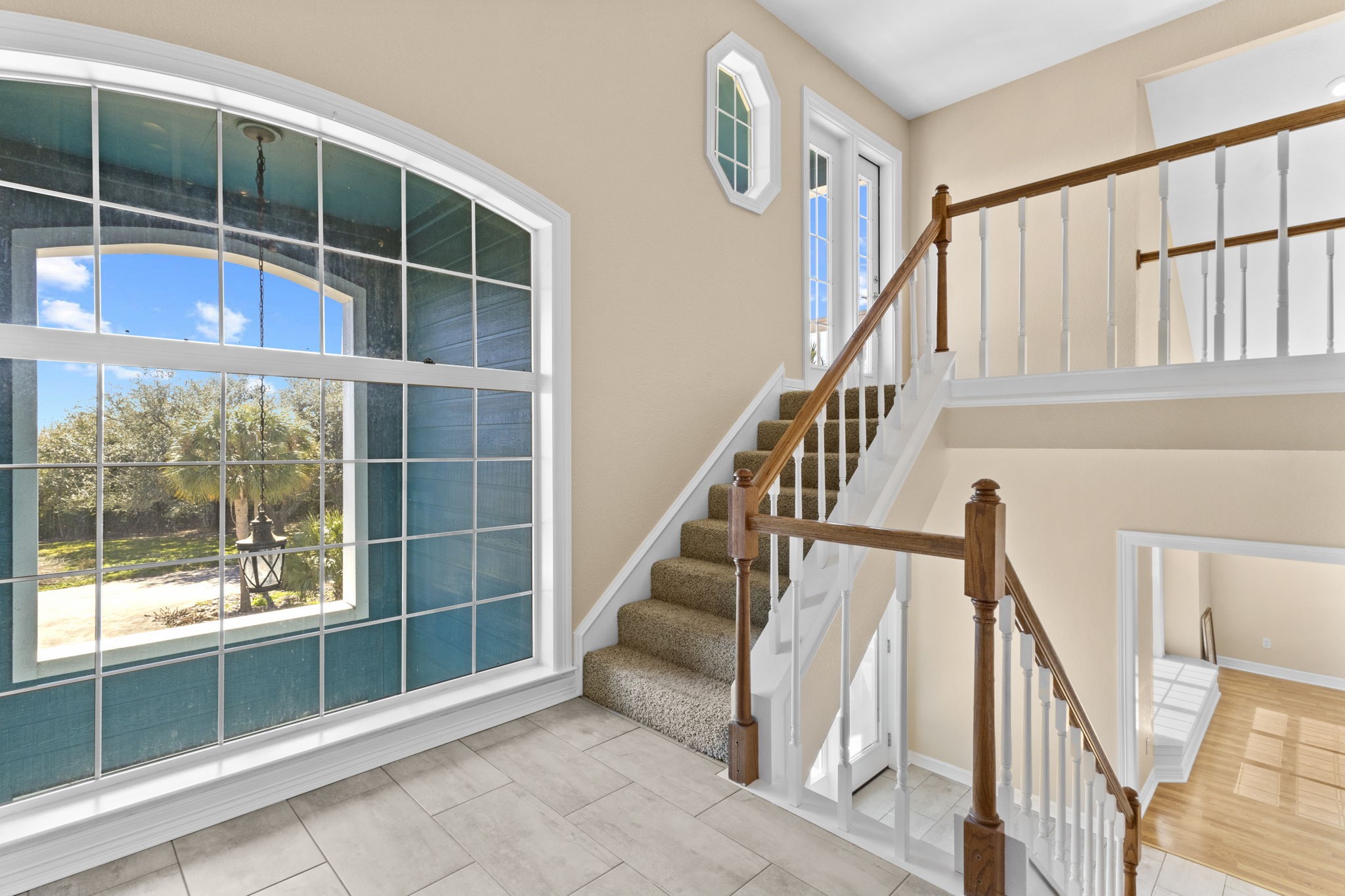 900 Southwind Port Arthur, TX 77640 - Photo 12 of 38 a view of staircase with white walls and windows