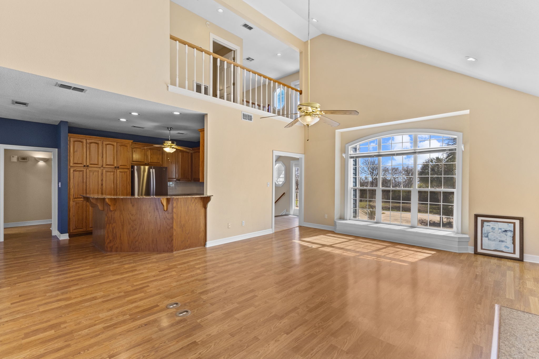 900 Southwind Port Arthur, TX 77640 - Photo 24 of 38 a view of an empty room with wooden floor and a window