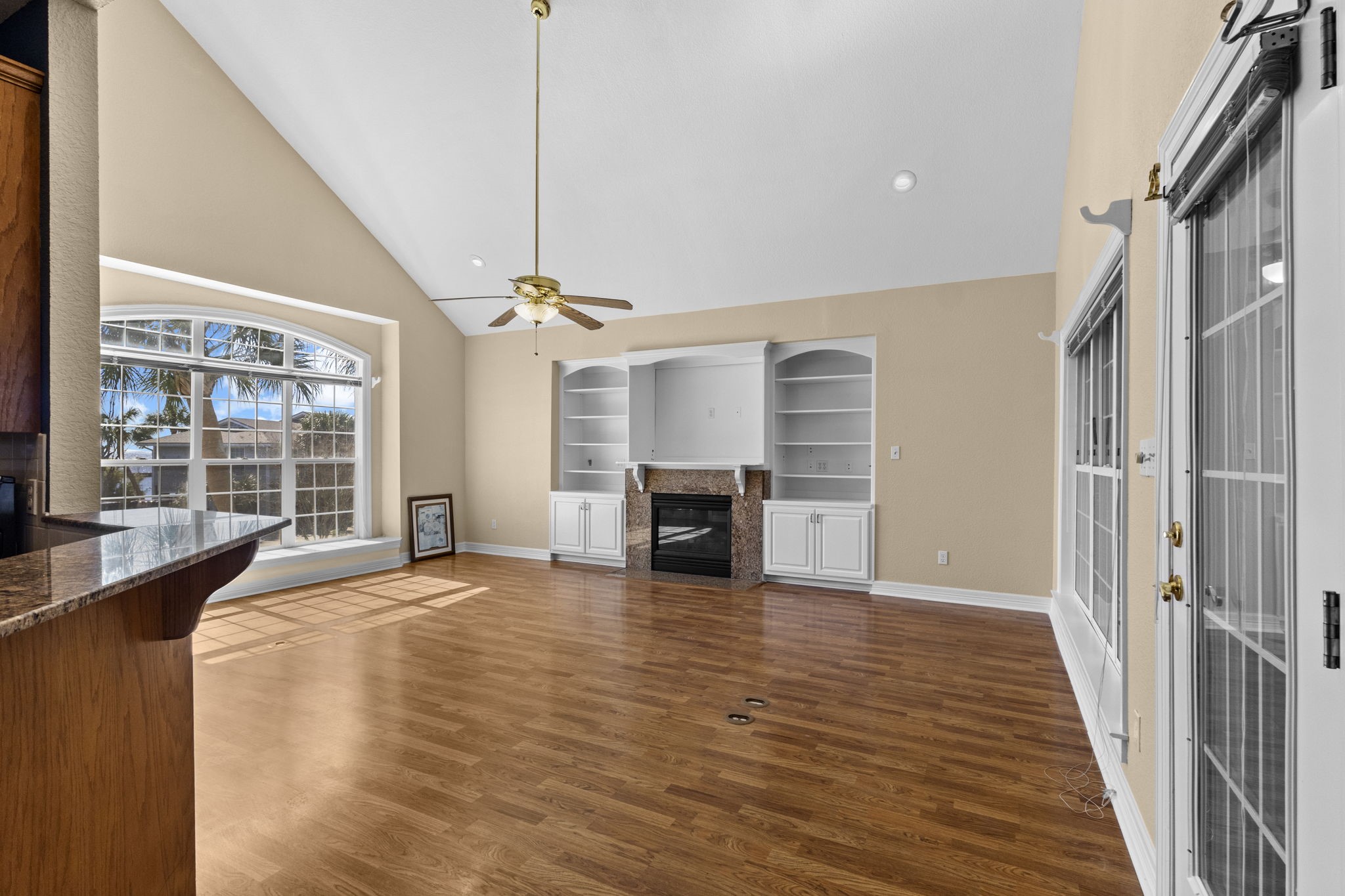 900 Southwind Port Arthur, TX 77640 - Photo 26 of 38 a view of a livingroom with a fireplace wooden floor and window