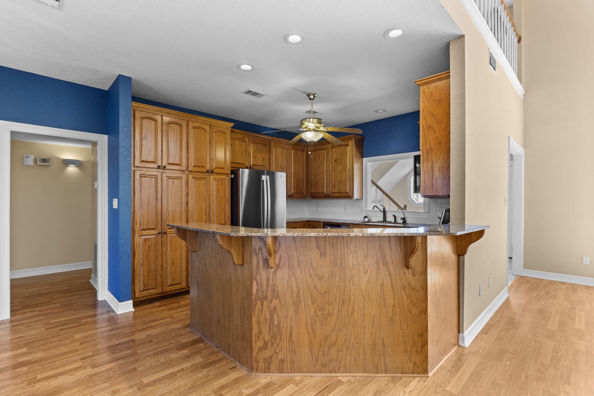 900 Southwind Port Arthur, TX 77640 - Photo 27 of 38 a view of kitchen with furniture and wooden floor