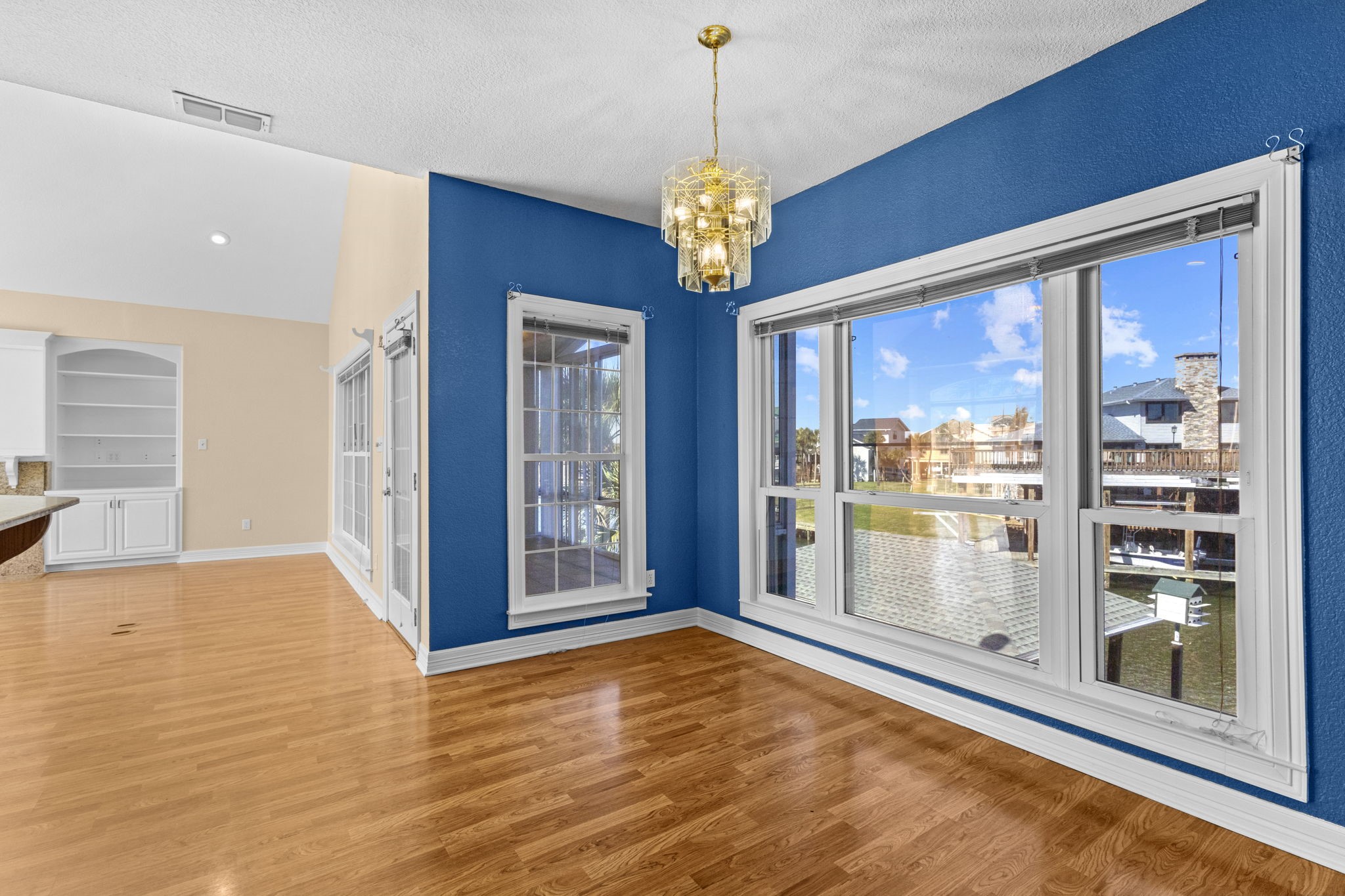 900 Southwind Port Arthur, TX 77640 - Photo 34 of 38 a view of an empty room with window and wooden floor