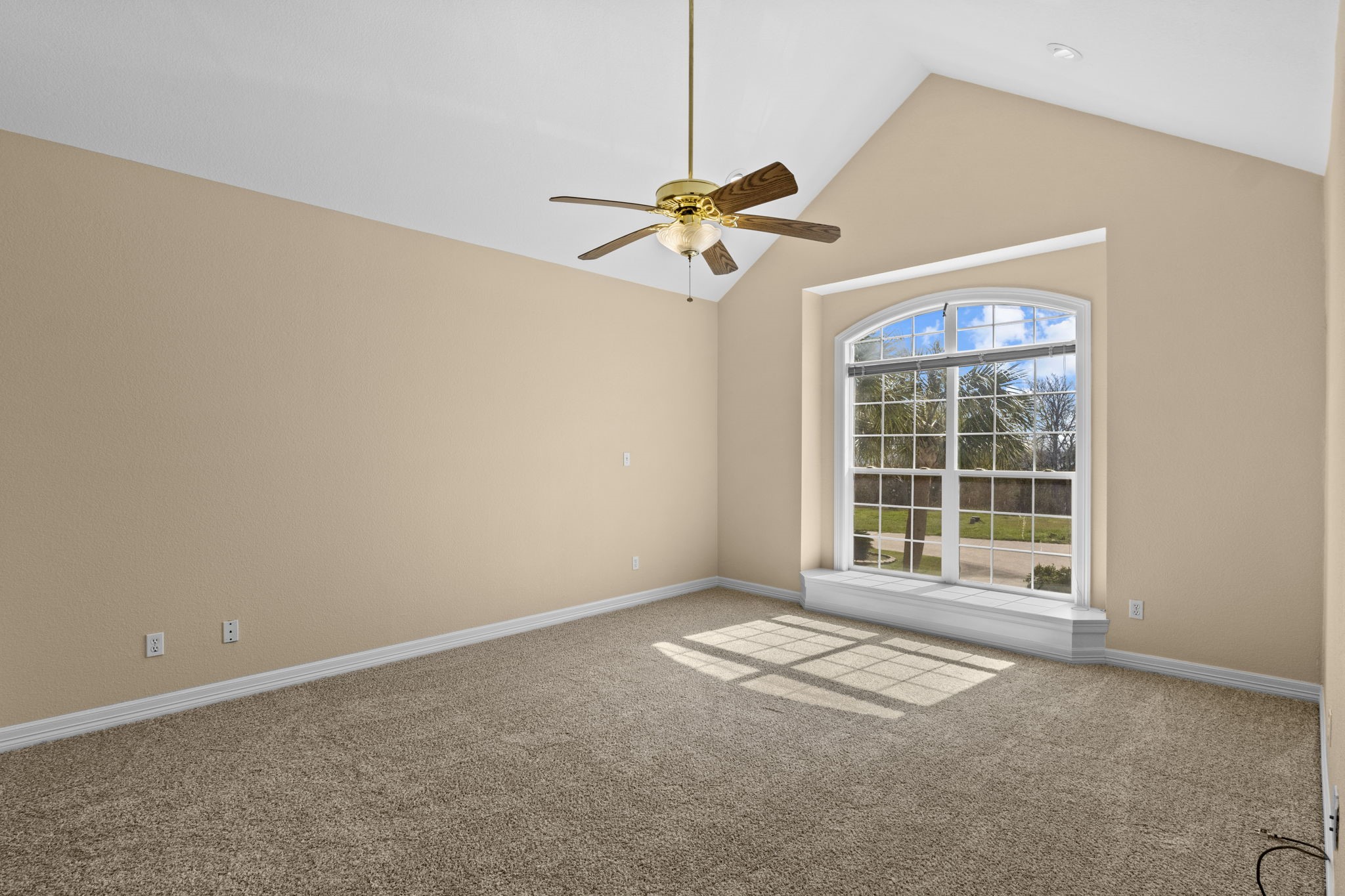 900 Southwind Port Arthur, TX 77640 - Photo 37 of 38 a view of a room with a ceiling fan and a window