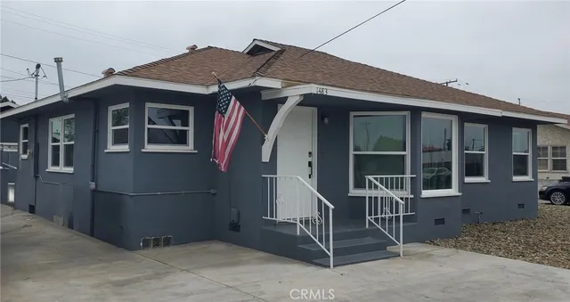a front view of a house with a porch