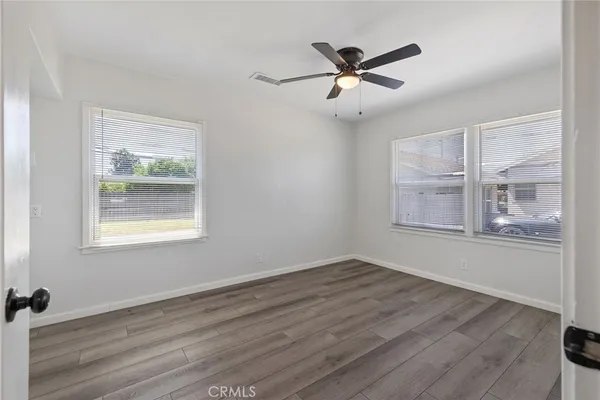 a view of bathroom with wooden floor