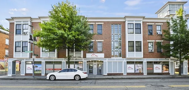 a car parked in front of a building