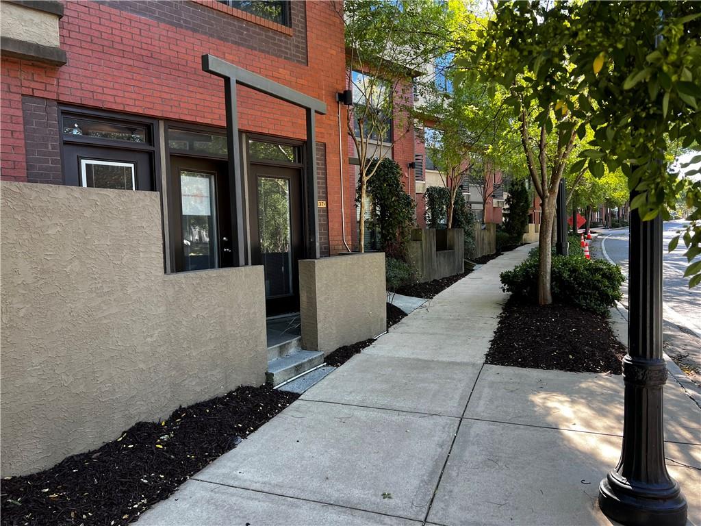 400 17th Street Northwest, Unit 1137 Atlanta, GA 30363 - Photo 1 of 1 a view of a pathway along the building